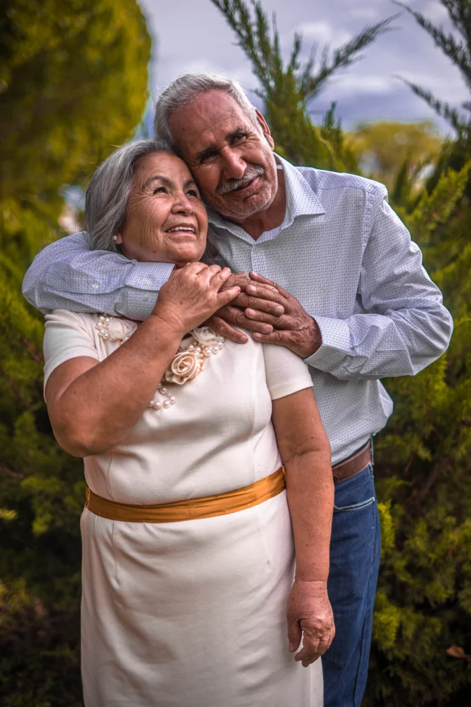 Senior couple hugging in the garden