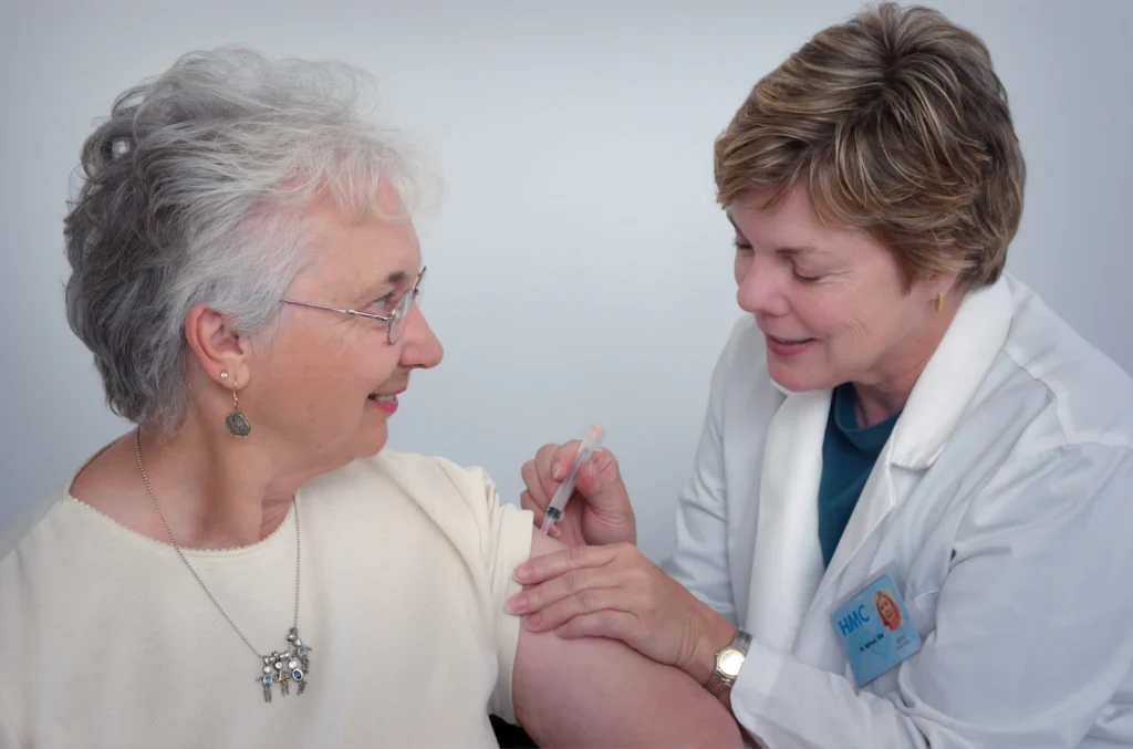 Nurse talking with a senior woman